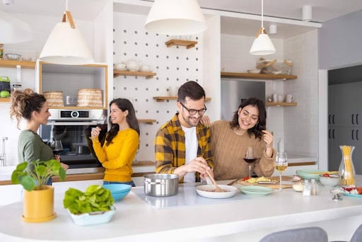 people eating in the kitchen