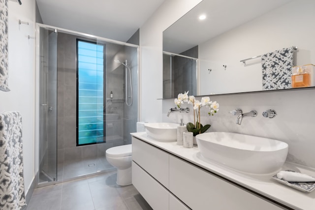 How long does a bathroom remodel in Durham, NC take? Most projects take one to two weeks to finish. It depends on the size of your bathroom and the work needed. We always work fast but never rush. Can I choose my style and materials? Yes, you can pick colors, tiles, vanities, and more. We help you choose items that fit your taste and space. You get a bathroom that feels like yours. Will a remodel add value to my home? Yes, it can make your home worth more. A new bathroom looks great and works better. Buyers also like clean, updated spaces. What if my bathroom is small? We design innovative layouts to make small bathrooms feel big. Floating vanities and open shelves save space. Mirrors and lights help the room look brighter. Do you offer other home remodeling services? Yes, we also provide things like interior painting services and window and door replacement. These can match your new bathroom style. That way, your whole home feels fresh.